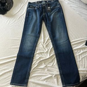 Never worn District 9 jeans. Size 30. Etta Skinny.
